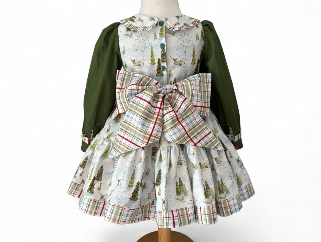 Back view of handmade Christmas dress for girls with oversized bow and button closure
