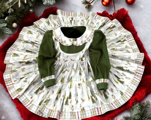 Holiday outfit for girls featuring green and white plaid tree farm fabric and statement bow