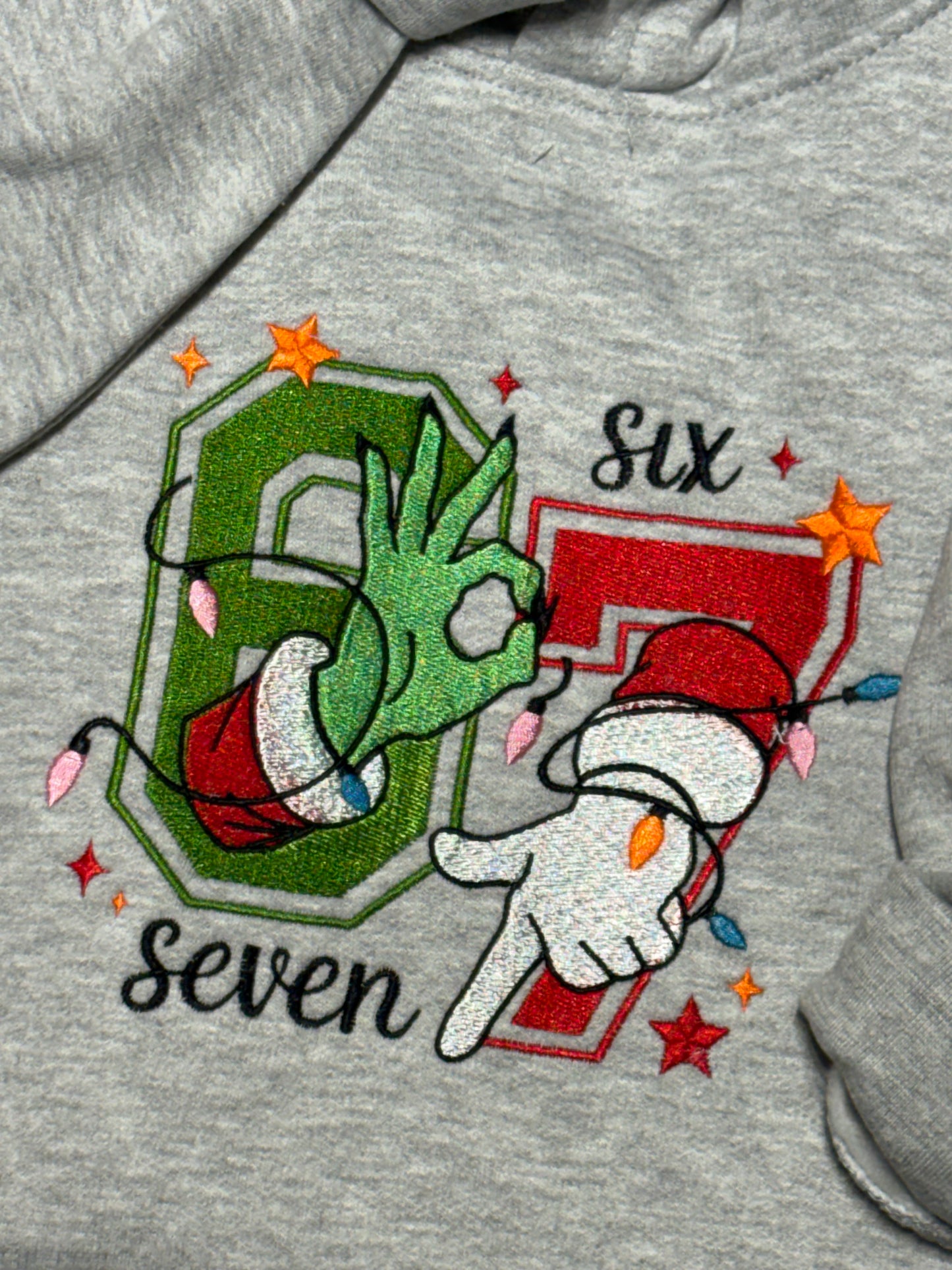 close up view of 67 embroidery hoodie