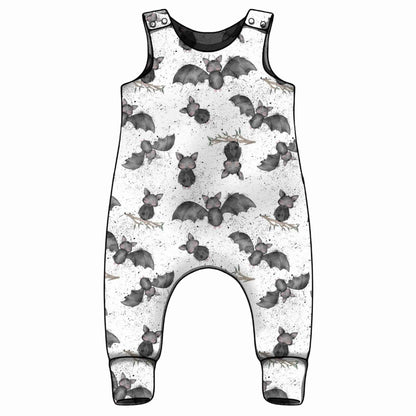 Baby romper with bat pattern on a white background