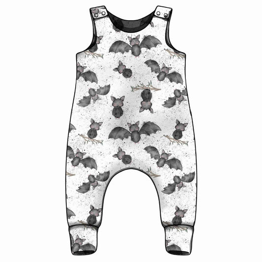 Baby romper with bat pattern on a white background