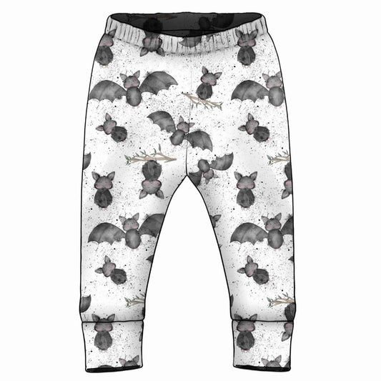 Children's leggings with an all-over bat print in shades of grey, featuring an elastic waistband and ankle cuffs.