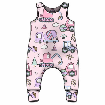 Baby romper with construction vehicle pattern on a white background