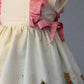 Peter rabbit frill dress side view of ties