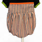 Front view of toddler Halloween romper – boutique-style outfit with festive stripes and playful seasonal colours.