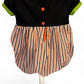 Back view of Halloween baby romper – handmade cotton romper with bow detail and snap fastenings for easy changes.