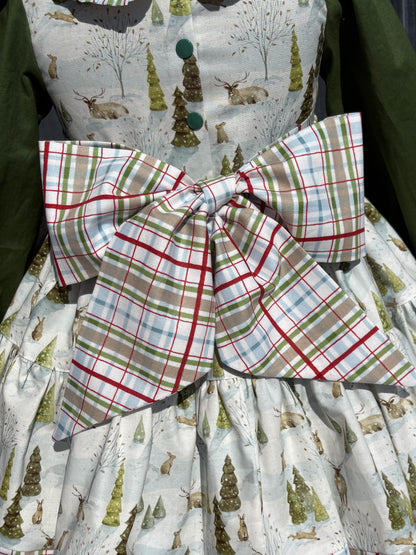 Plaid fabric with green, red, and white pattern