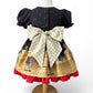 Handmade children’s Christmas dress in Lewis & Irene Away in a Manger nativity print with gold star bow, sizes 12 months to 6 years