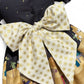 Festive toddler and girls dress featuring Away in a Manger nativity scene fabric, handmade in 100% cotton with puff sleeves and oversized bow.