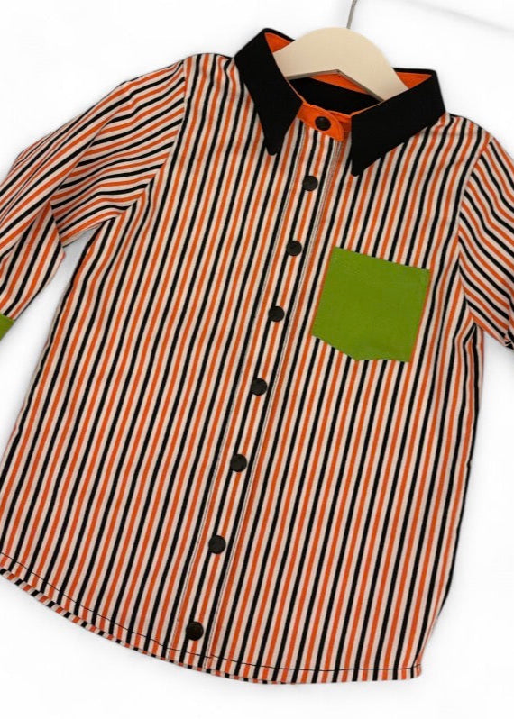 Front view of toddler Halloween shirt – festive black and green cotton shirt with classic collar and popper fasteners.