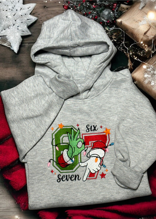 Kids soft grey hoodie embroidered with festive red and green ’67’ Christmas design