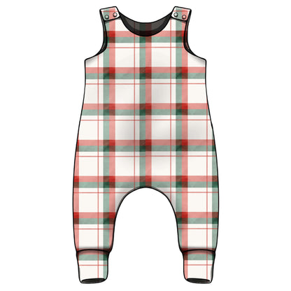 A sleeveless baby romper with a red, green, and white plaid pattern and popper fasteners 
