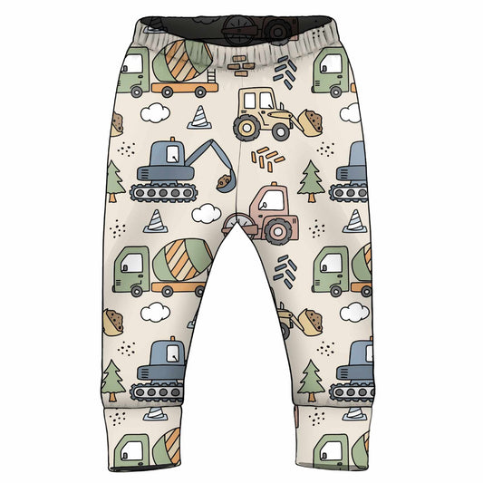 Children's leggings with construction vehicle pattern on a white background
