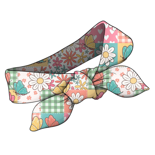 Colourful floral butterfly headband on a patchwork background