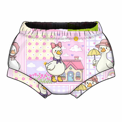 Cartoon duck design on baby bummies with a white background