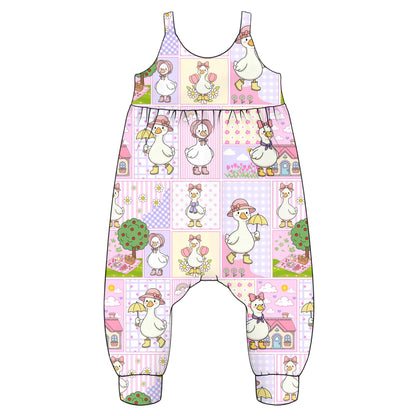 Children's napa romp0er with a pattern of cartoon silly goose patchwork design 