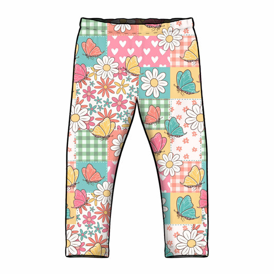 Colorful patterned leggings with flowers and butterflies in a patchwork design