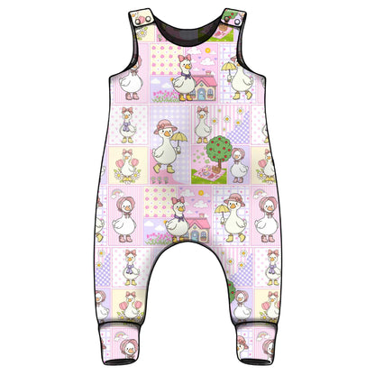 Baby romper with cartoon silly goose patchwork pattern. 