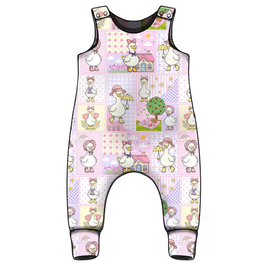 Baby romper with cartoon silly goose patchwork pattern. 