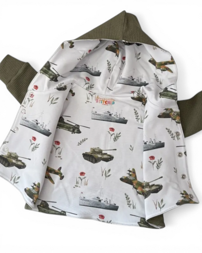 Personally Stitched army green waffle knit hooded cardigan with a military print lining featuring tanks, planes, and ships.
