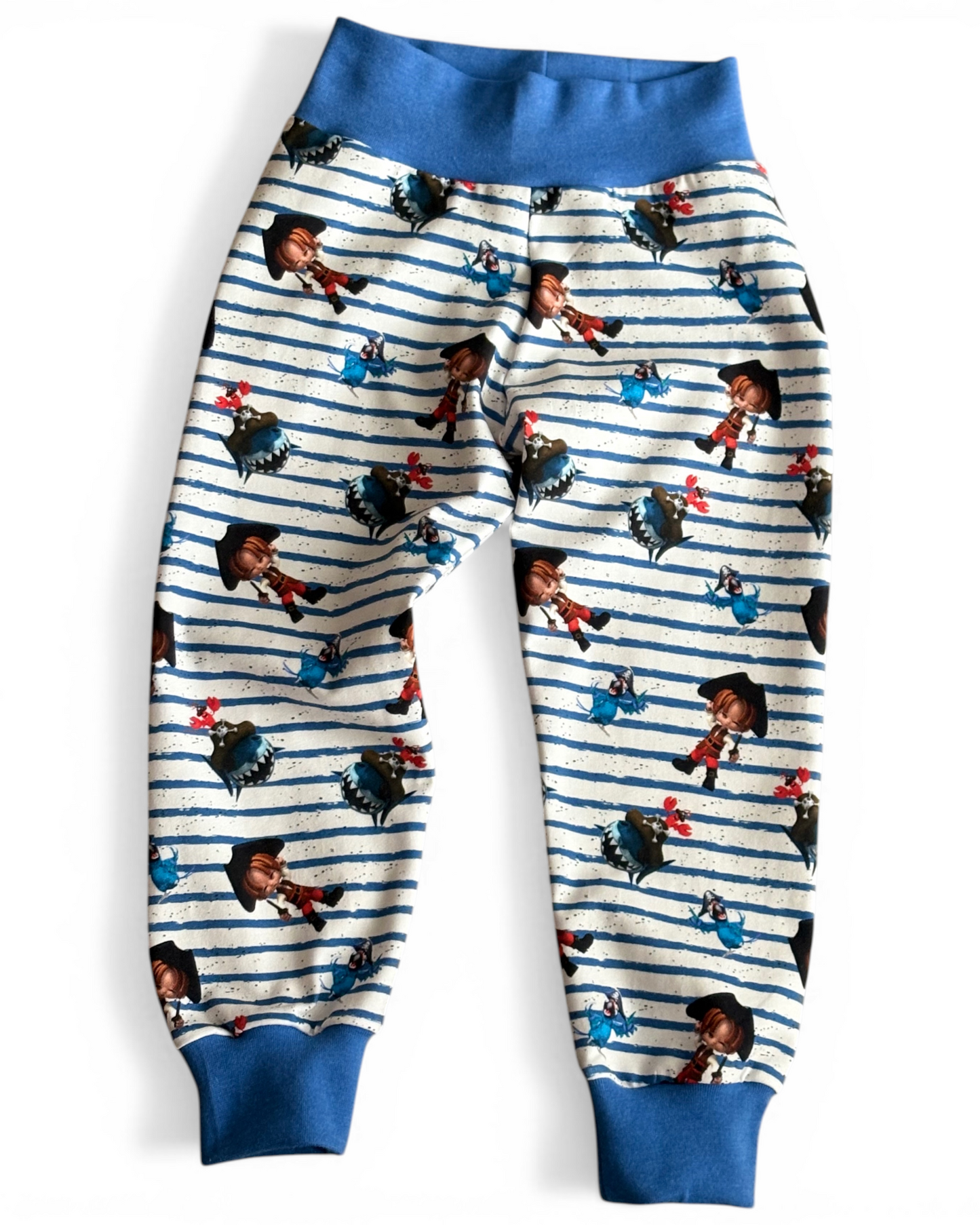 Personally Stitched blue and white striped organic cotton jersey joggers for 2-3 years with a fun pirate print, yoga waistband and cuffs.