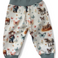 Personally Stitched sea green organic cotton jersey joggers with a farm animal and butterfly print, featuring a yoga waistband and cuffed ankles.
