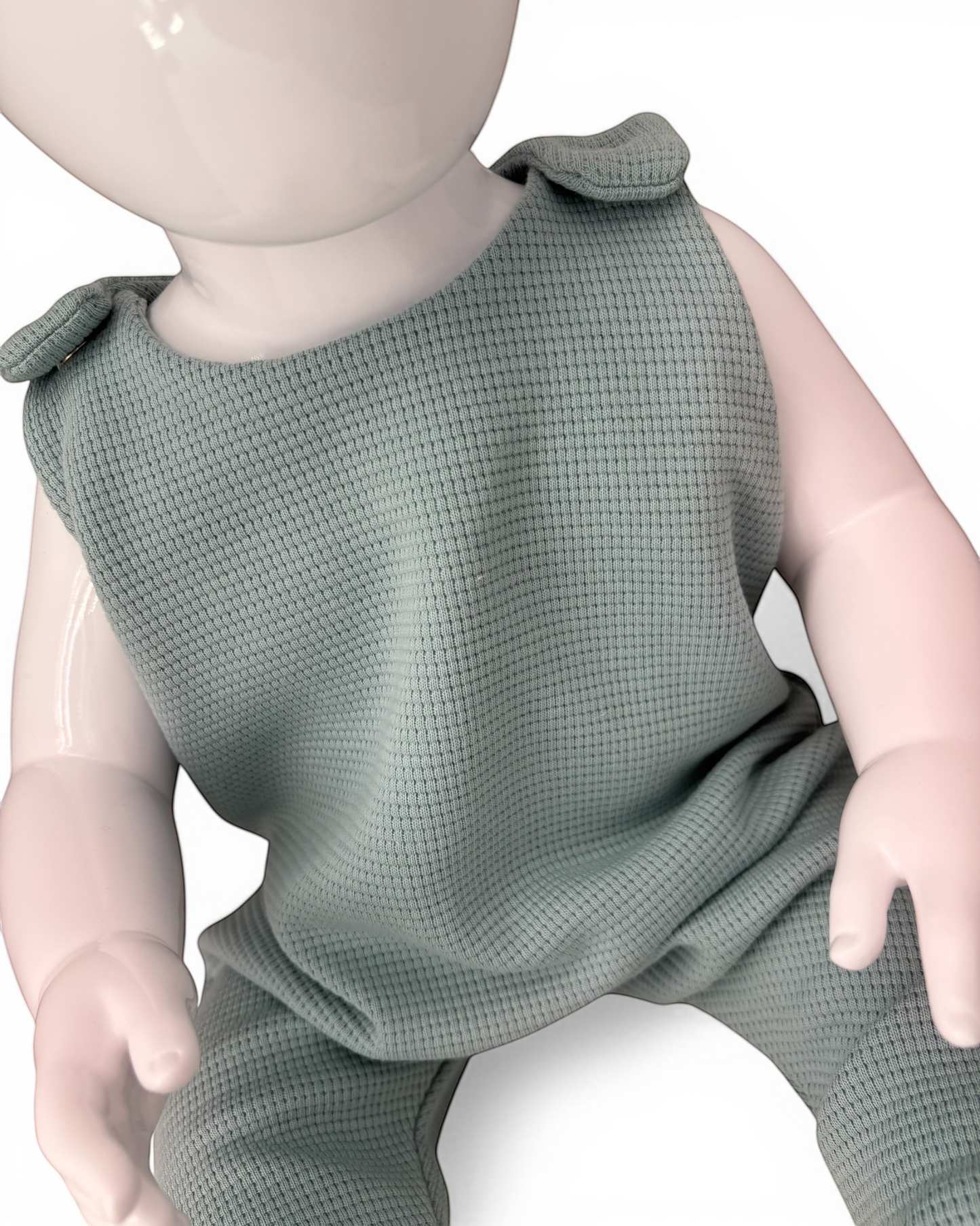 Personally Stitched sea green waffle knit cotton romper for babies 0-3 months. Handmade, breathable, and soft.