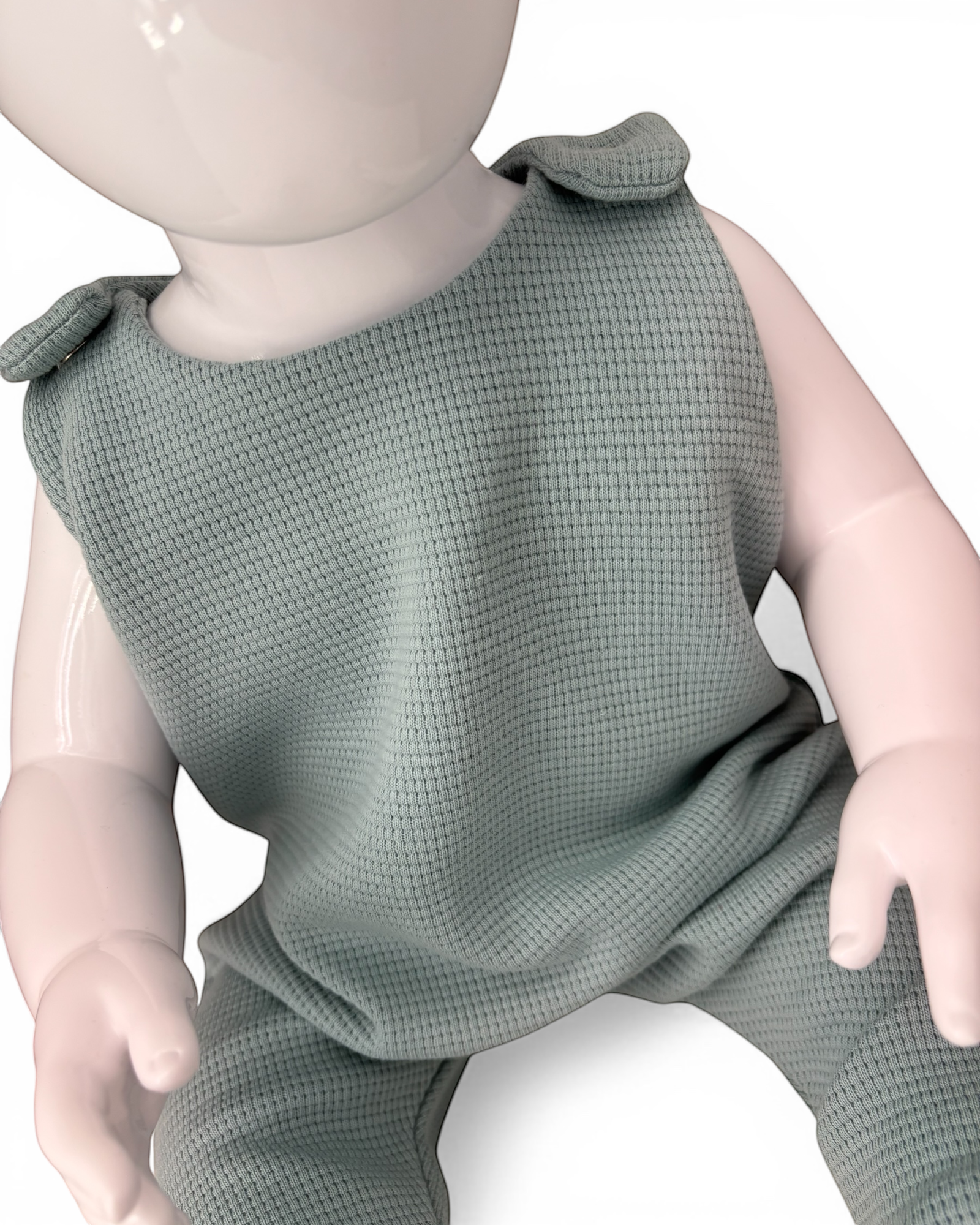 Personally Stitched sea green waffle knit cotton romper for babies 0-3 months. Handmade, breathable, and soft.