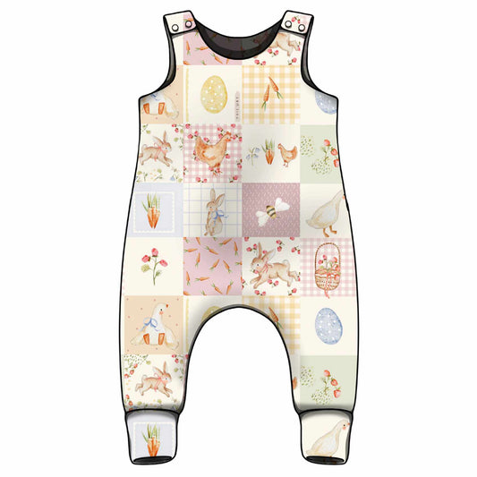 Baby romper with Spring-themed patchwork design with matching print for the ankle cuffs.
